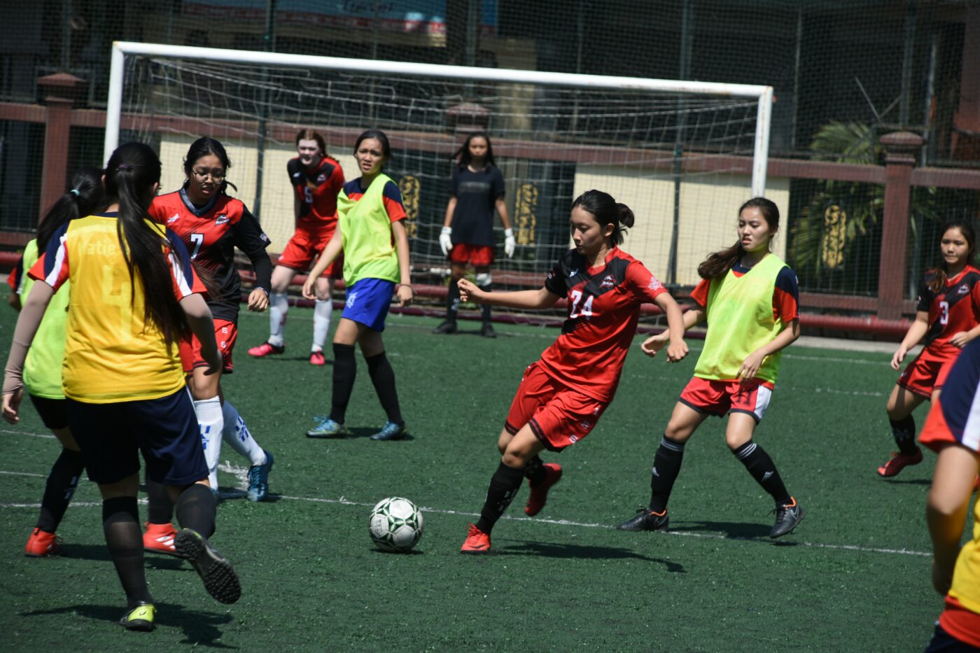 group of young women playing football